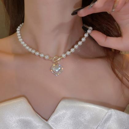 Luxury Designer Pearl Heart Pendent Necklace..
