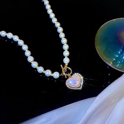 Luxury Designer Pearl Heart Pendent Necklace..